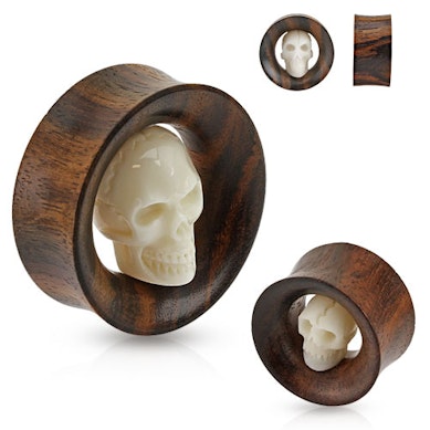 Tunel de ureche cu craniu sculptat