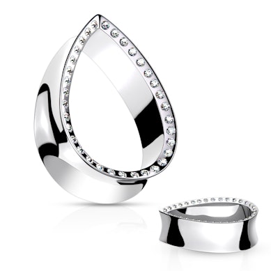 Tunel în formă de lacrimă cu pietre pavate pe margine