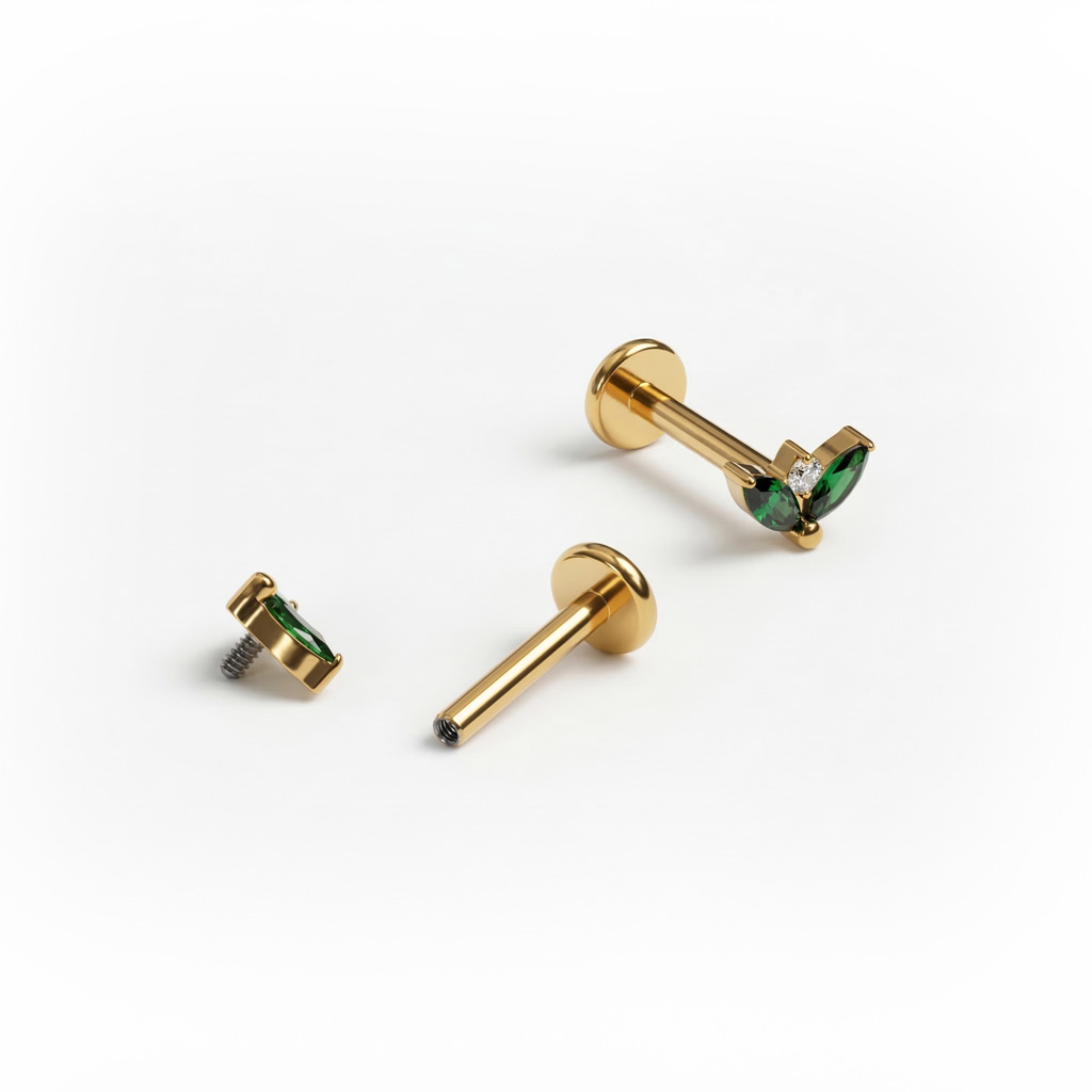 Labret din titan cu două pietre de culoarea smaraldului