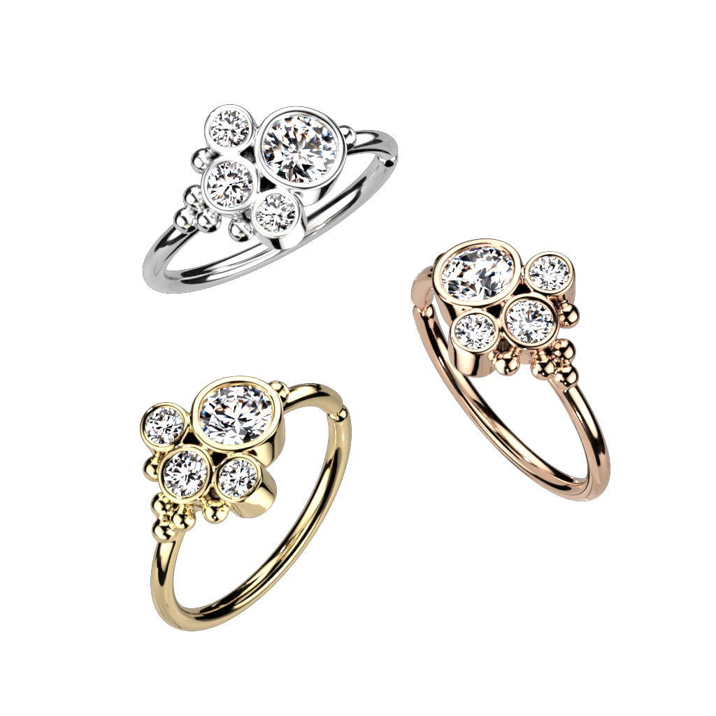 Cercel răsucit cu bilă și grup de pietre